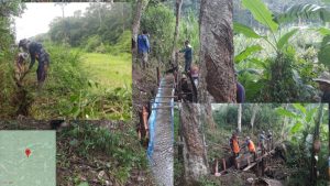 Secara Swadaya, kelompok Tani Sungai Merindu Pungut Hilir Goro Memperbaiki Talang Air Irigasi yang Rusak.